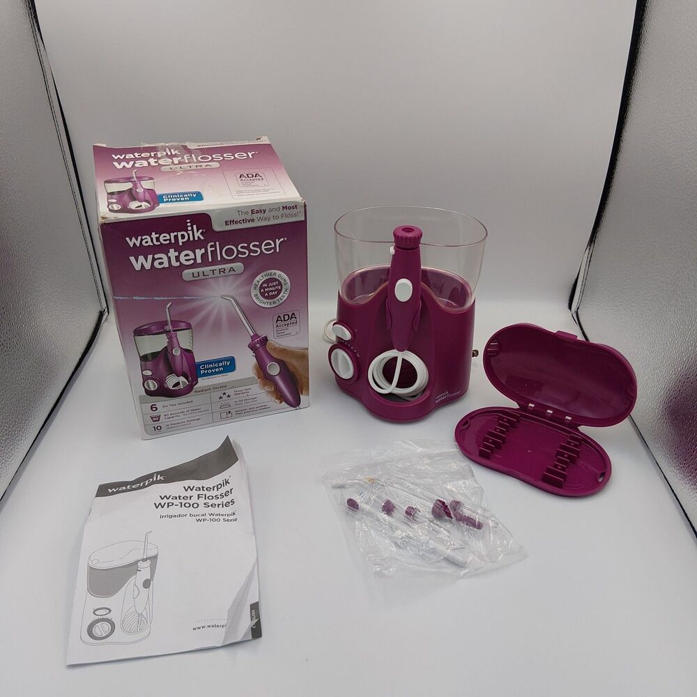 Waterpick Water Flosser Oral Irrigator  Ultra- Radiant Orchid- Pink Color WP 100